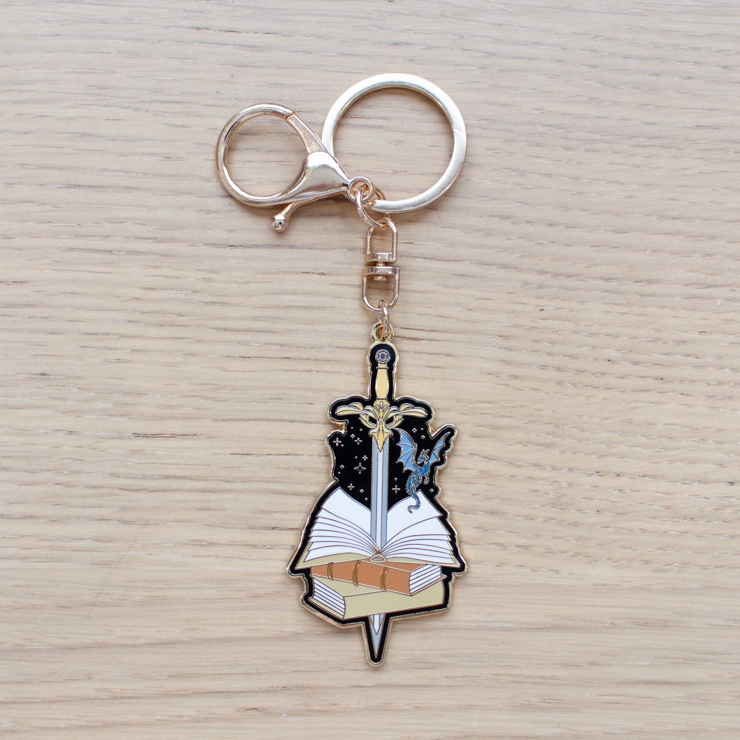 Sword & Books Enamel Keychain