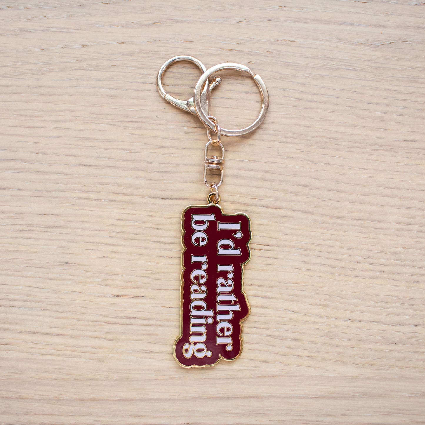 Rather Be Reading Enamel Keychain