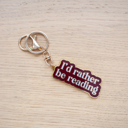 Rather Be Reading Enamel Keychain