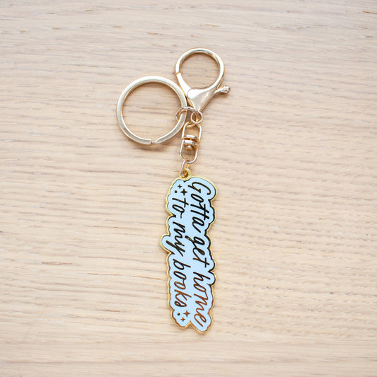 Gotta Get Home to My Books Enamel Keychain